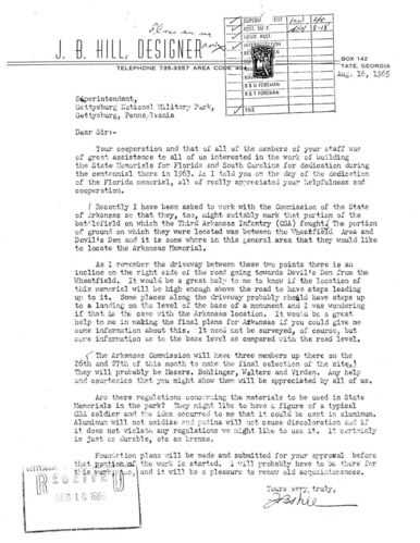 White paper with typed black text and a handwritten signature