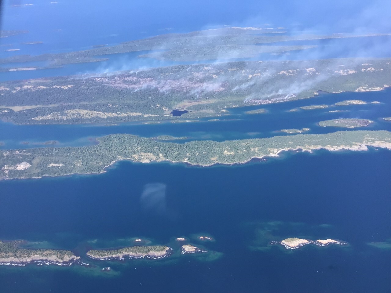 An aerial view of smoke billowing from Isle Royale.