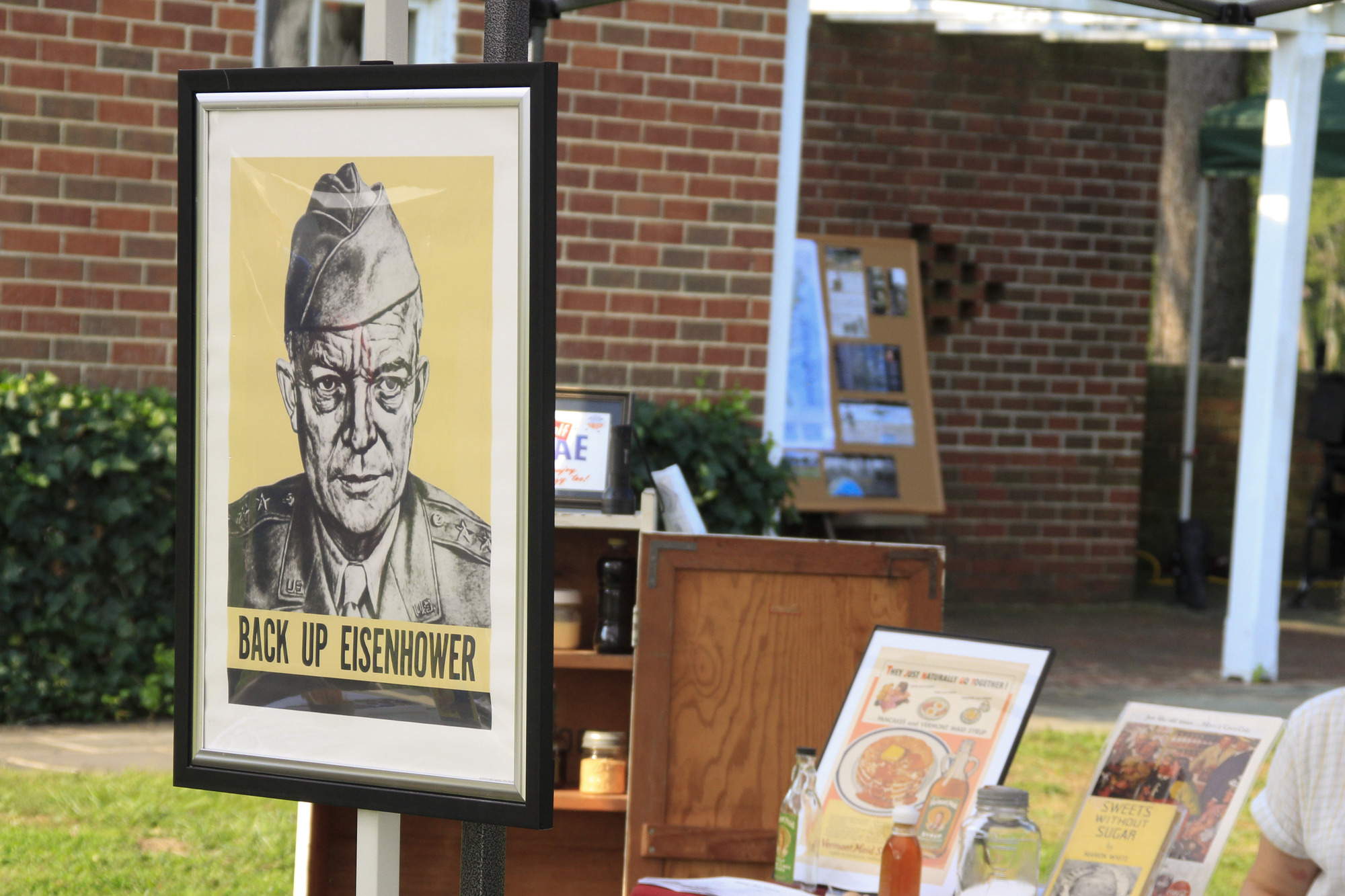 A sign with Dwight D. Eisenhower that says "Back Up Eisenhower"