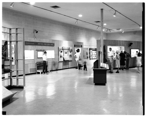 Visitors viewing the interpretive displays in the old Mission 66 Visitor Center and Museum.