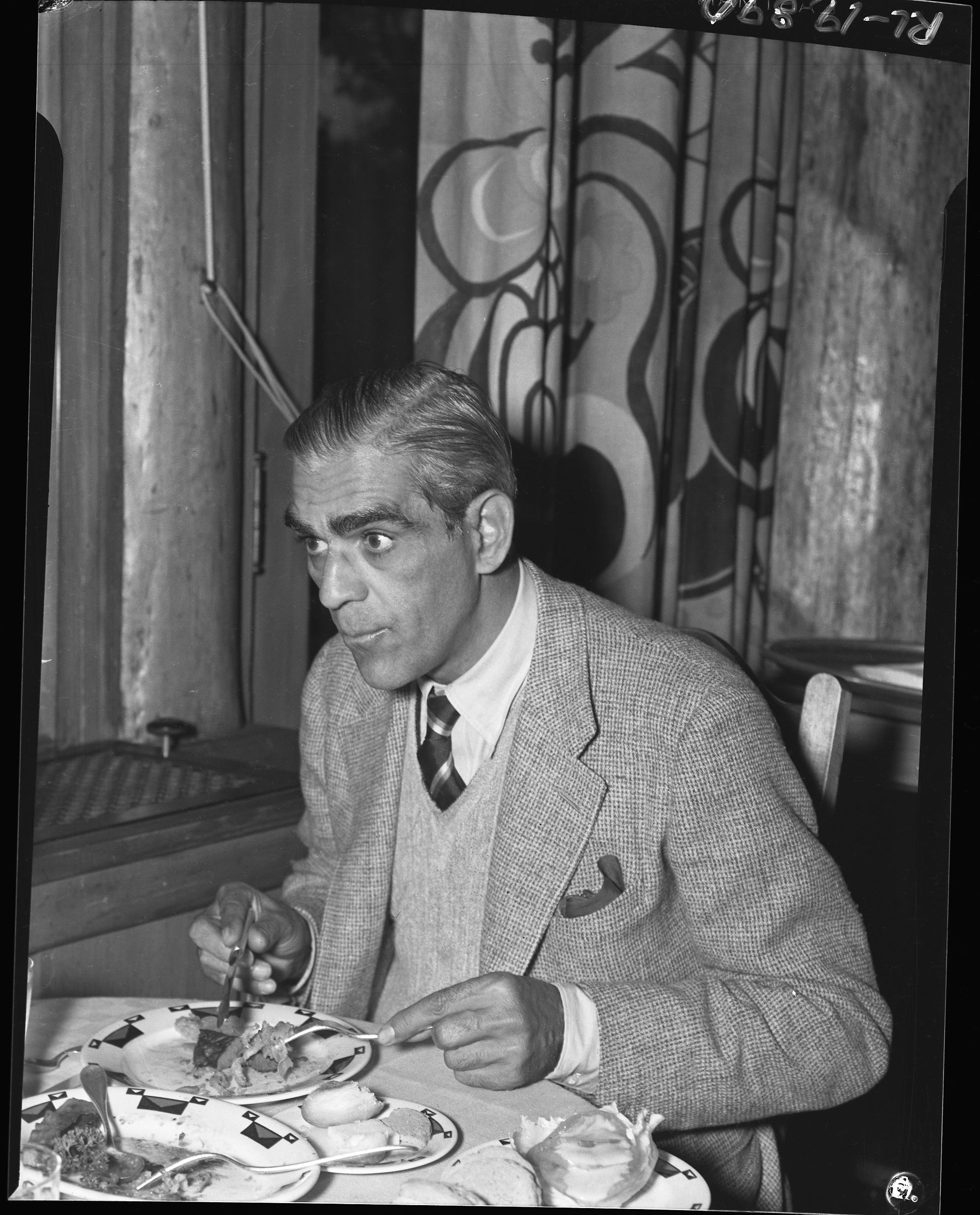 Boris Karloff dining at The Ahwahnee. Copy negative RL-19,889. See also RL-19,891 and RL-892.