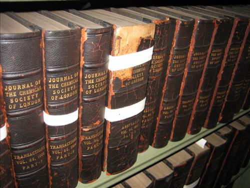 2011 Images of deteriorating books in Thomas Edison's personal library of books in the Family Living Room of his home, Glenmont.