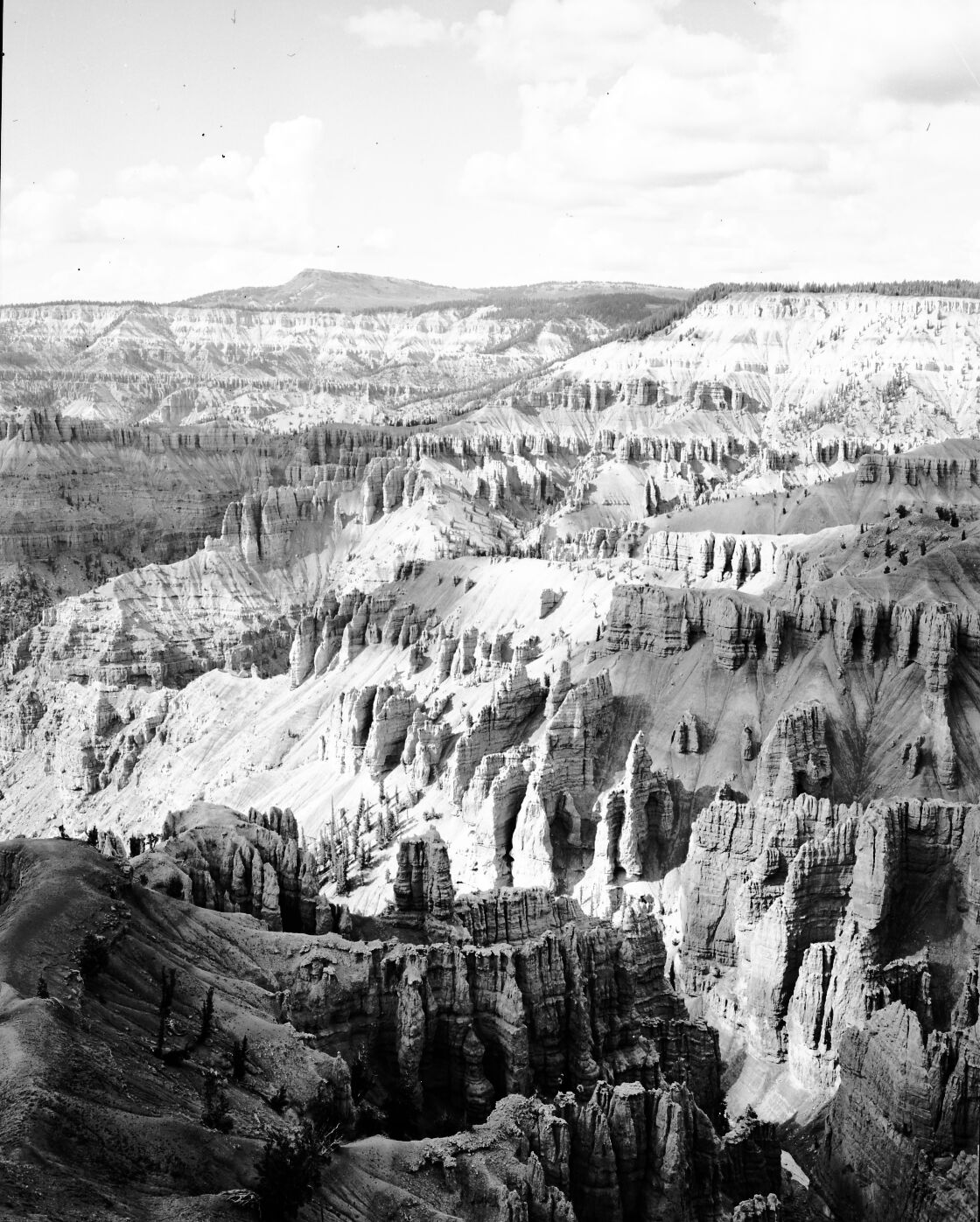 The amphitheater at Cedar Breaks National Monument, with shadows from the clouds.