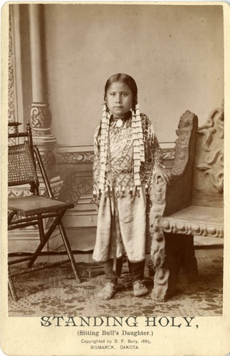 Standing Holy, daughter of Sitting Bull, with Dentallium Shell Hair Ties.