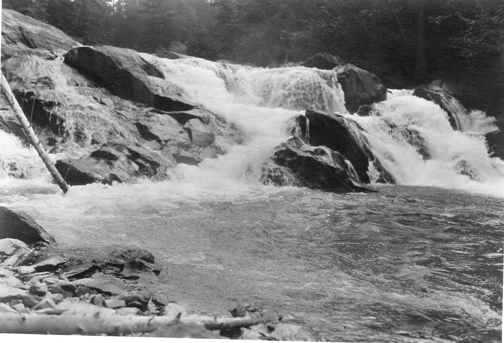 Cascade flowing into river