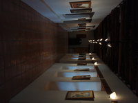 A row of framed pictures.