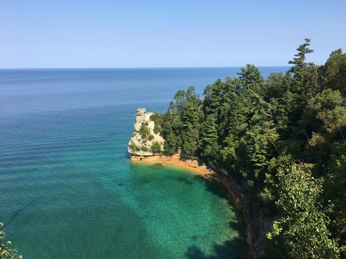 Miners Castle is a sandstone feature that reminded early European explorers of a castle. It looks like a round turret on top. It sticks out into Lake Superior.