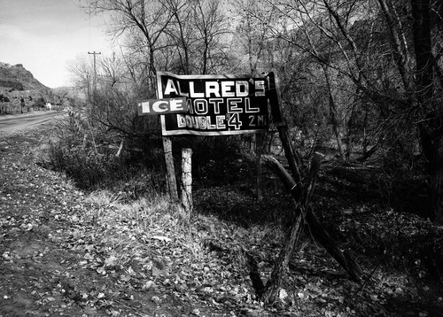 Roadside signs in Springdale, Allred's Motel.