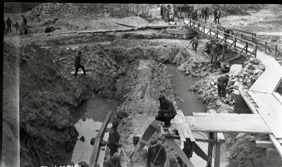 Original construction of protective dam for 6' cast iron pipe across the Virgin River.