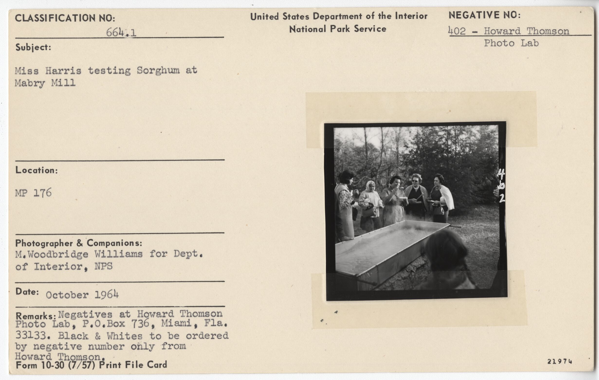 Miss Harris testing sorghum at Mabry Mill