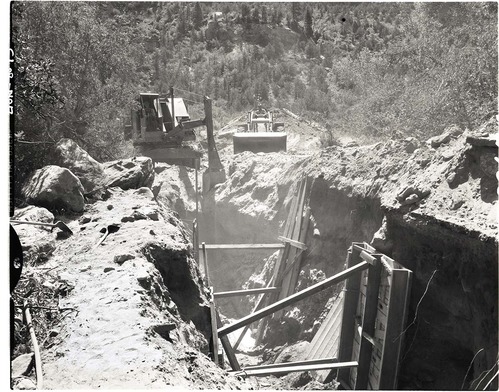 Water supply system - mouth of Birch Creek- excavating trench for water line.