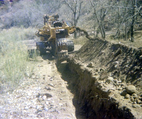 Construction vehicle in operation during the utilities project at Zion Lodge.