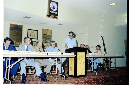 Color Photos of John Lancaster's farewell party at Elks Club in St. George, Utah. Speakers at roast in front of room: Pipe Spring National Monument Superintendent, TWA Steve Tedder, Chief of Maintenance, Chief Naturalist, John Lancaster, Crazy D, Administrative Officer, Cedar Breaks National Monument Superintendent, Chief Ranger, Unknown Skier.