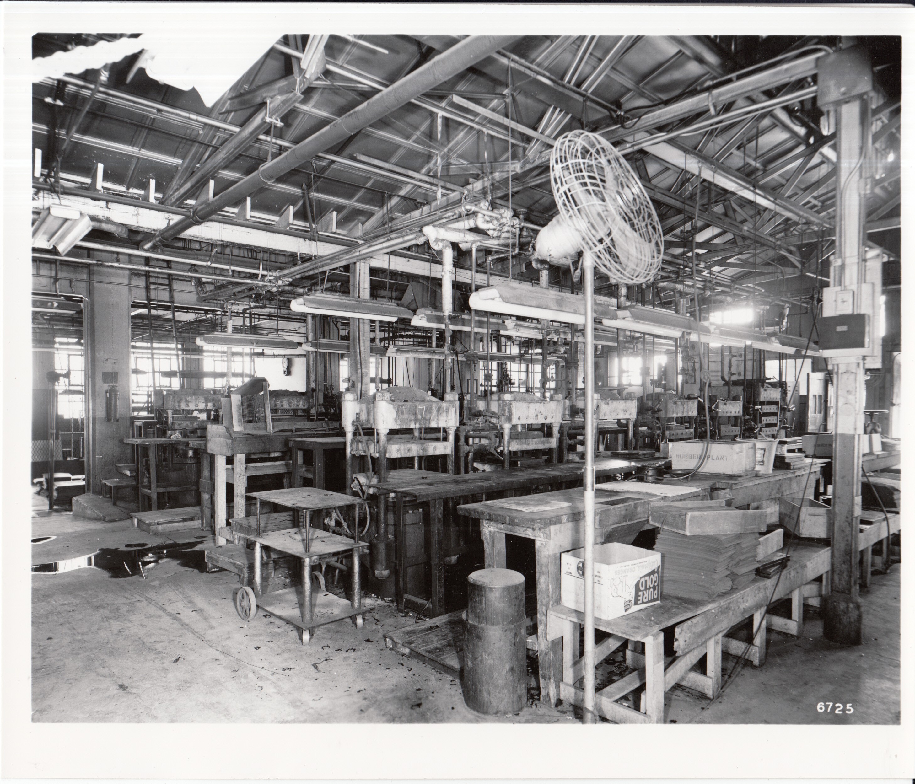 Edison Storage Battery Division, rubber plant building, interior, presses.