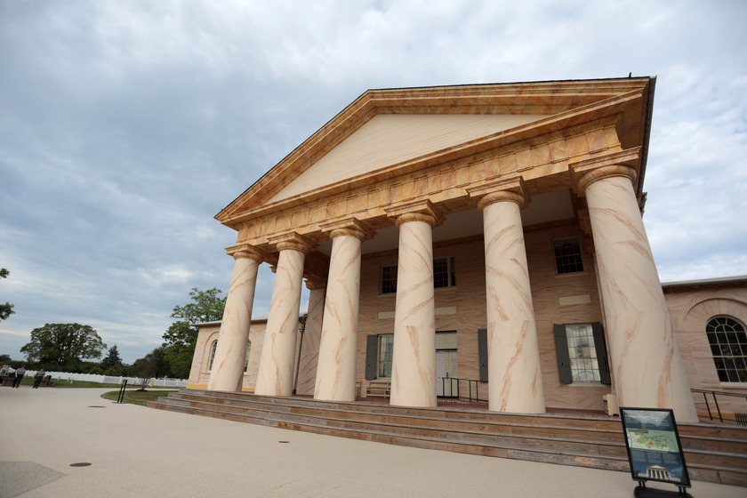 Portico of the plantation house at Arlington House, The Robert E. Lee Memorial. A large building with columns made to look like marble. 