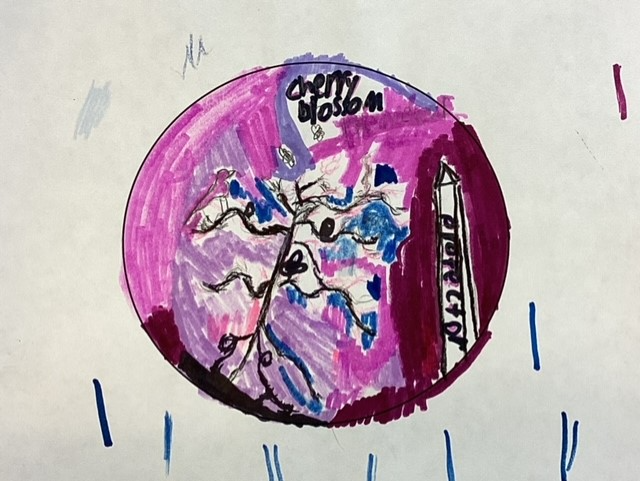 Drawing of spindly brown branches along a thin trunk with blue blossoms against a circular background of several shades of pink, with the Washington Monument to the right. Handwritten text across the top of the circle says Cherry Blossom. Sideways text along the Washington Monument says Protector