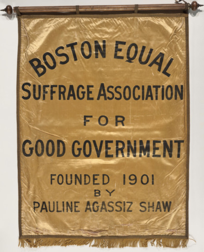 Gold Banner that reads Boston Equal Suffrage Association for Good Government founded 1901 by Pauline Agassiz Shaw.