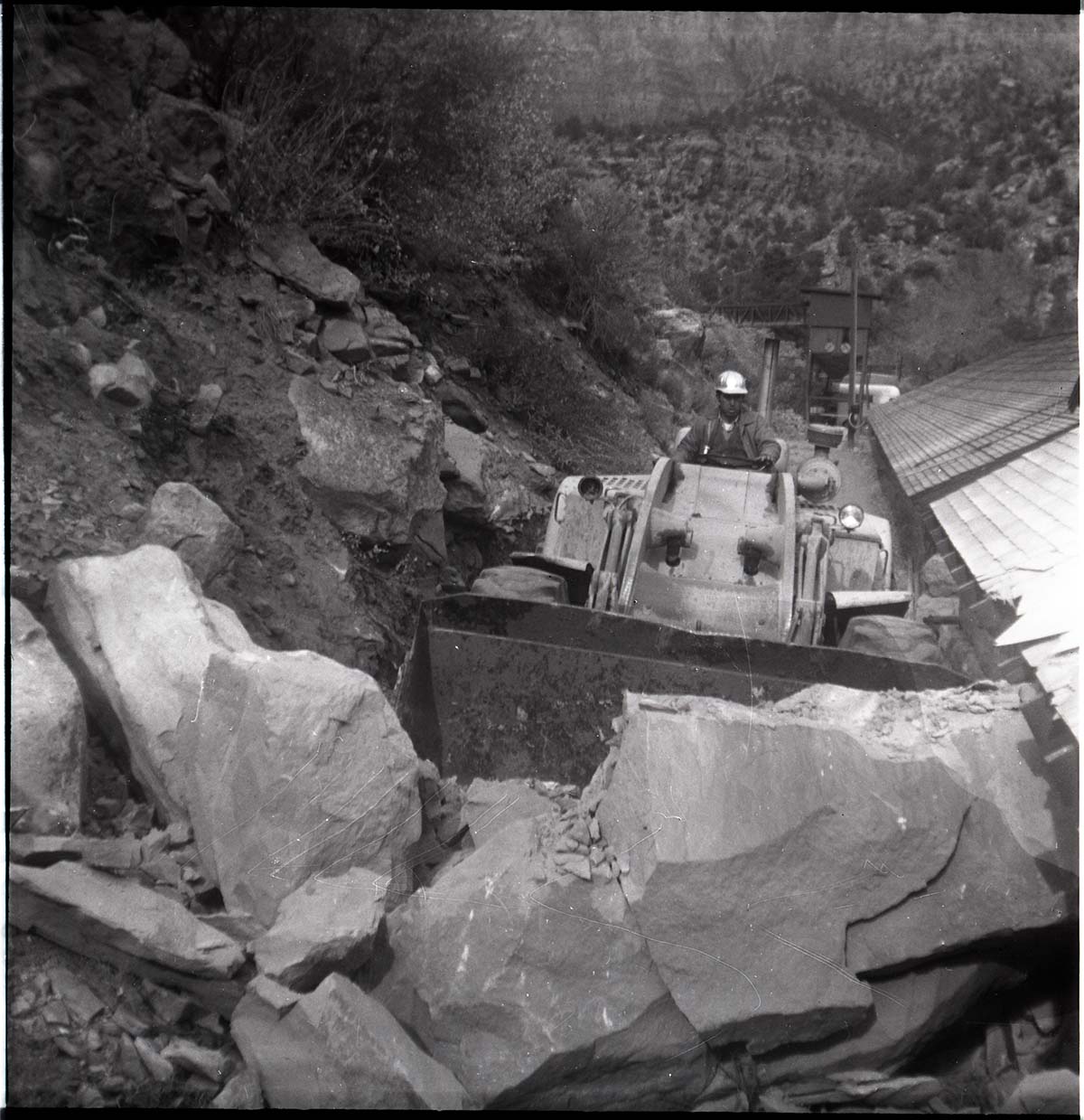 BW photo of rock slide in the maintenance yard.