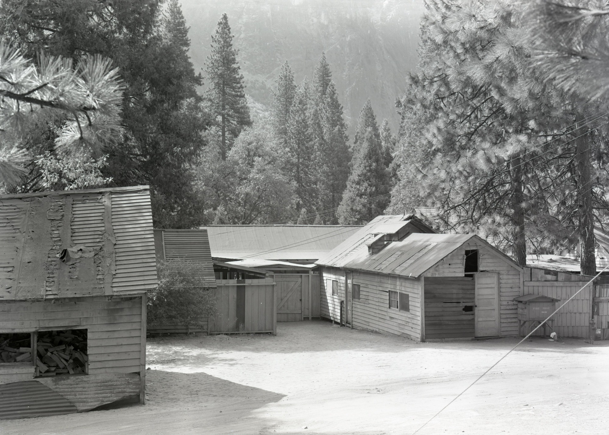 Rear view of dilapidated buidlings at Yosemite Lodge. 1947. Used in Concessions Report in RL-seps. 979.447, Y-16C #31
