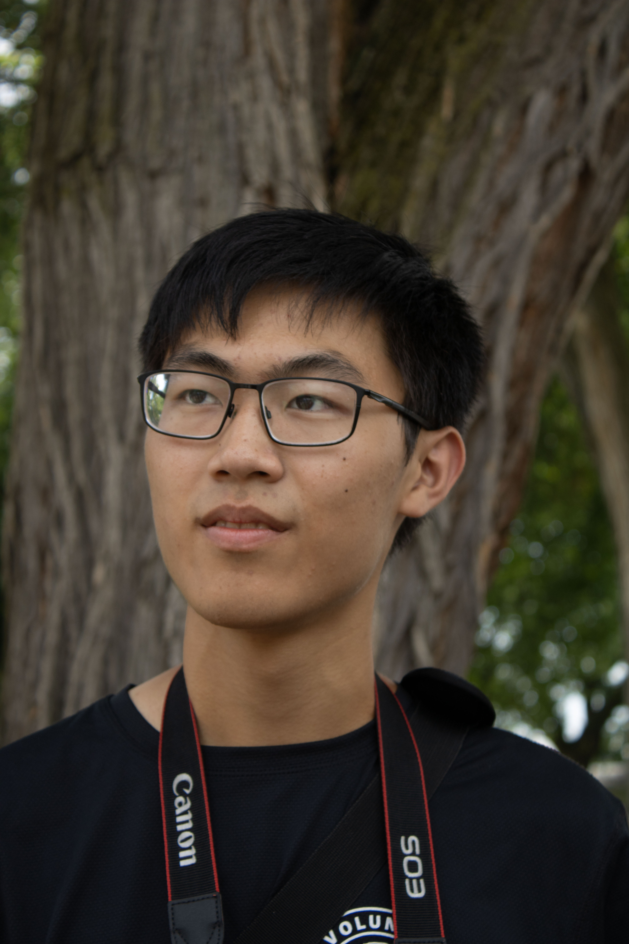 The White House and President’s Park student volunteer Joseph Kang looks off into the distance. 