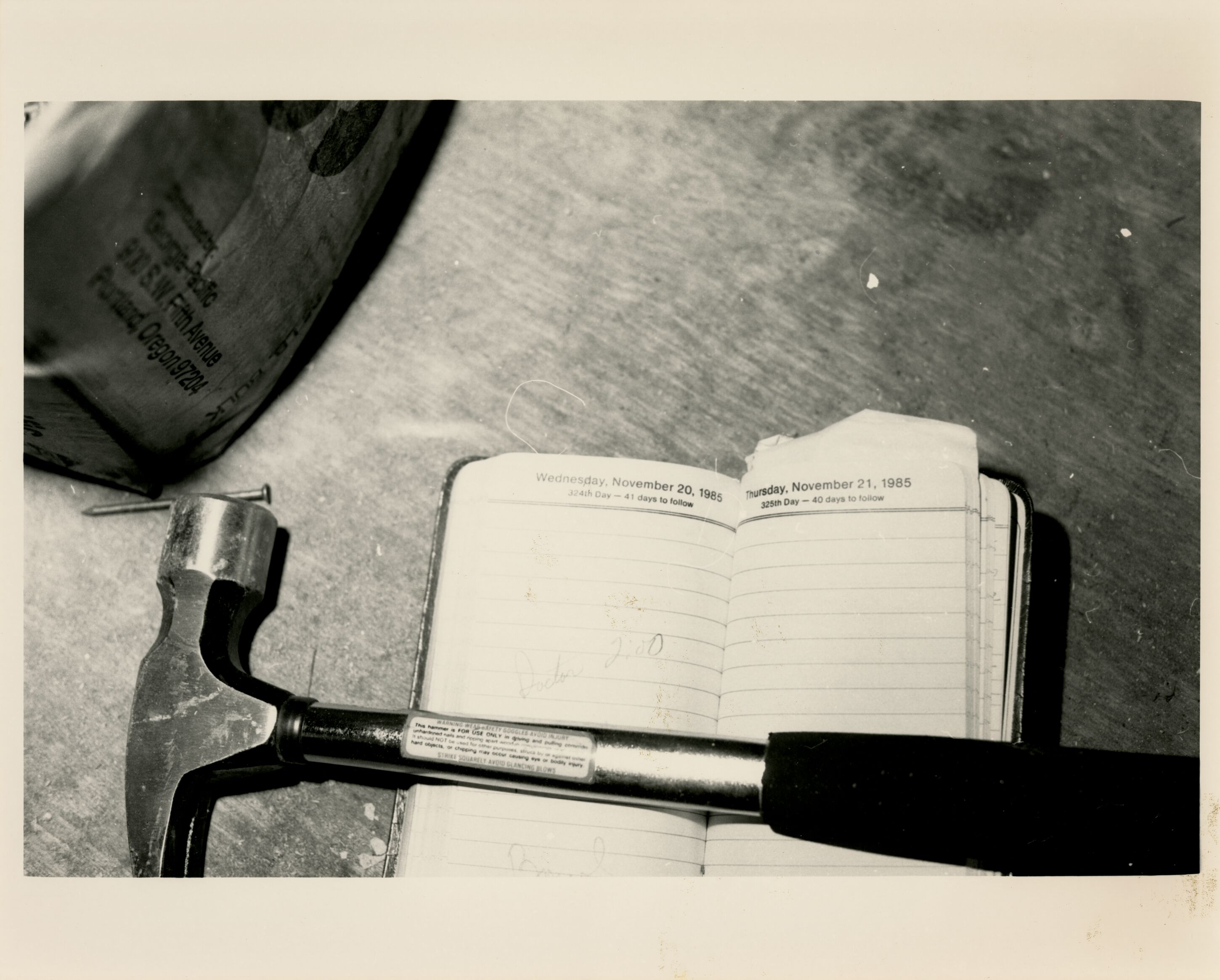 Hammer and notebook