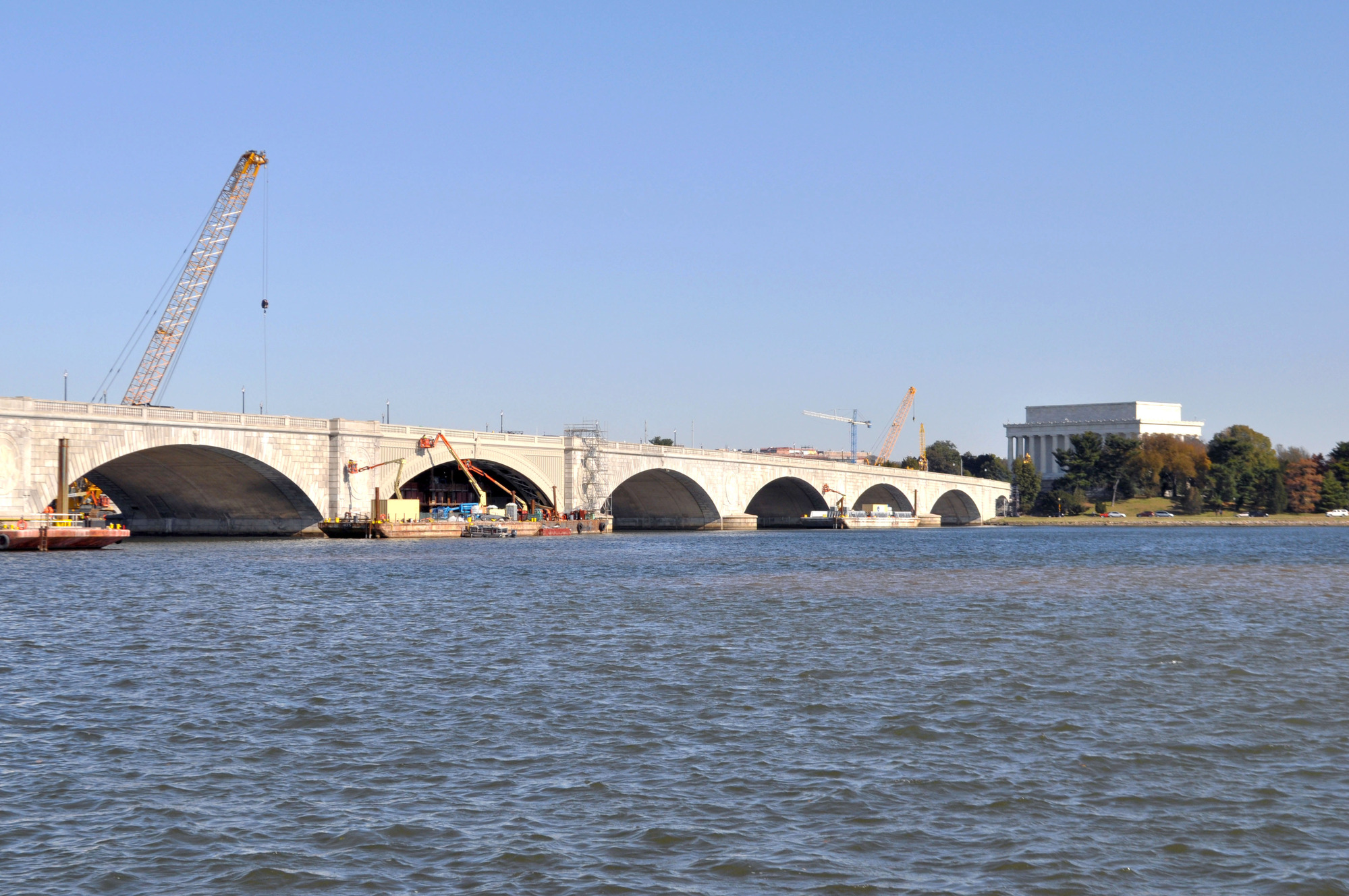 Construction on Arlington Memorial Bridge in November of 2019. Cranes on barges assist in the rehabilitation of the Arlington Memorial Bridge. 