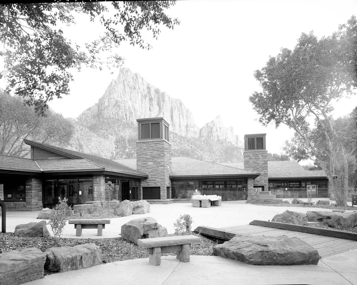 The 2000 visitor center after completion, part of the transportation project which included the shuttle buses, bus maintenance area, the new visitor center (Watchman campground, old a-loop), and new human history museum.