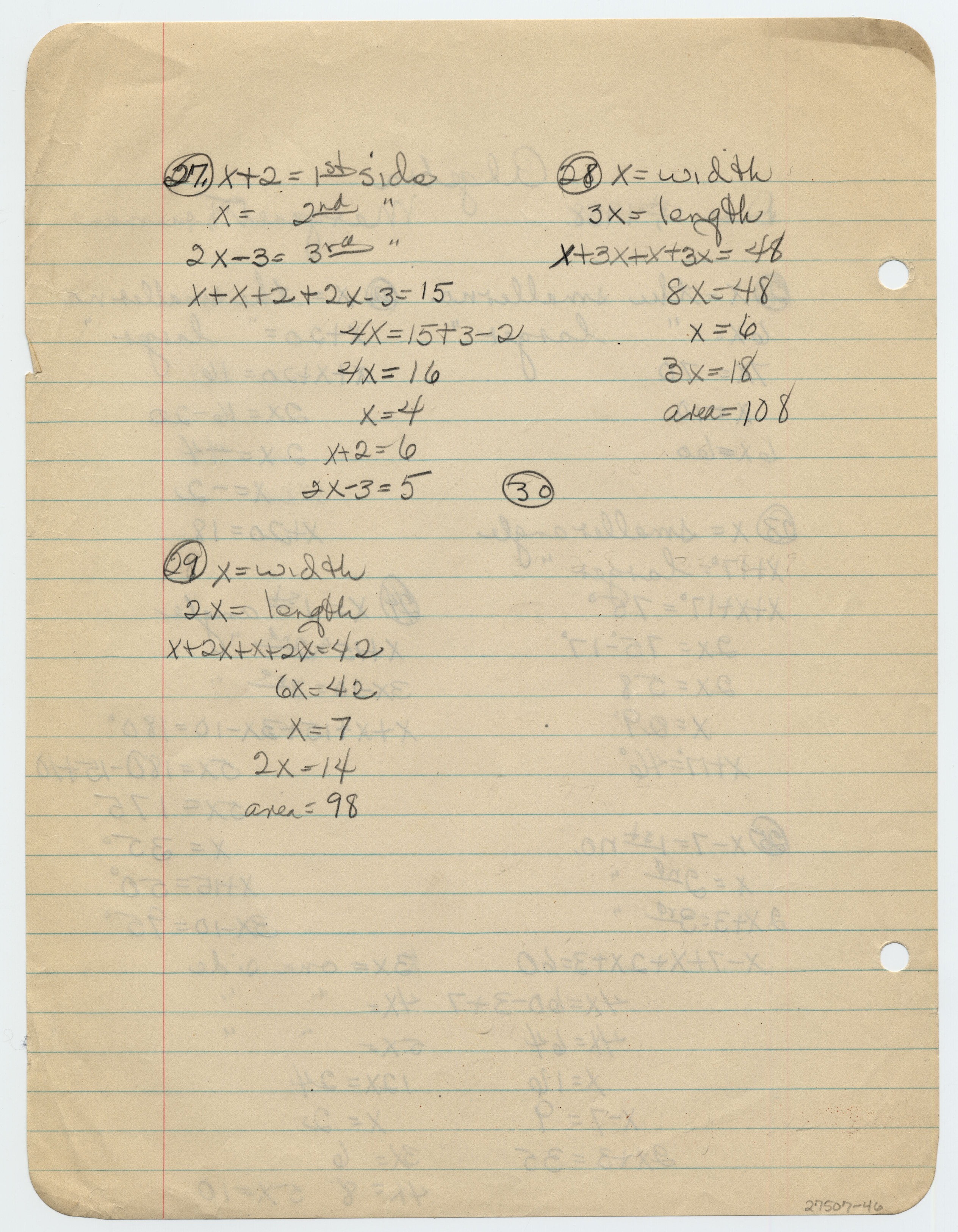 The school work is written on lined notebook paper.