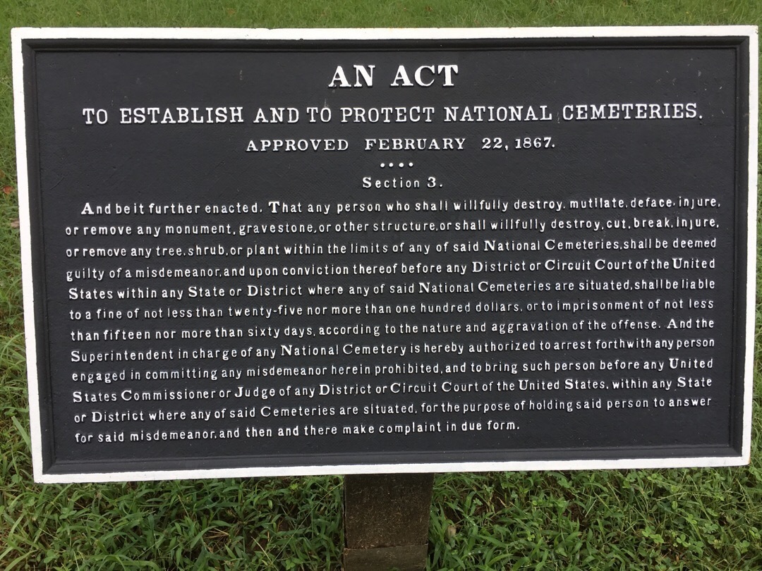 A plaque noting the Act to Establish and to Protect National Cemeteries