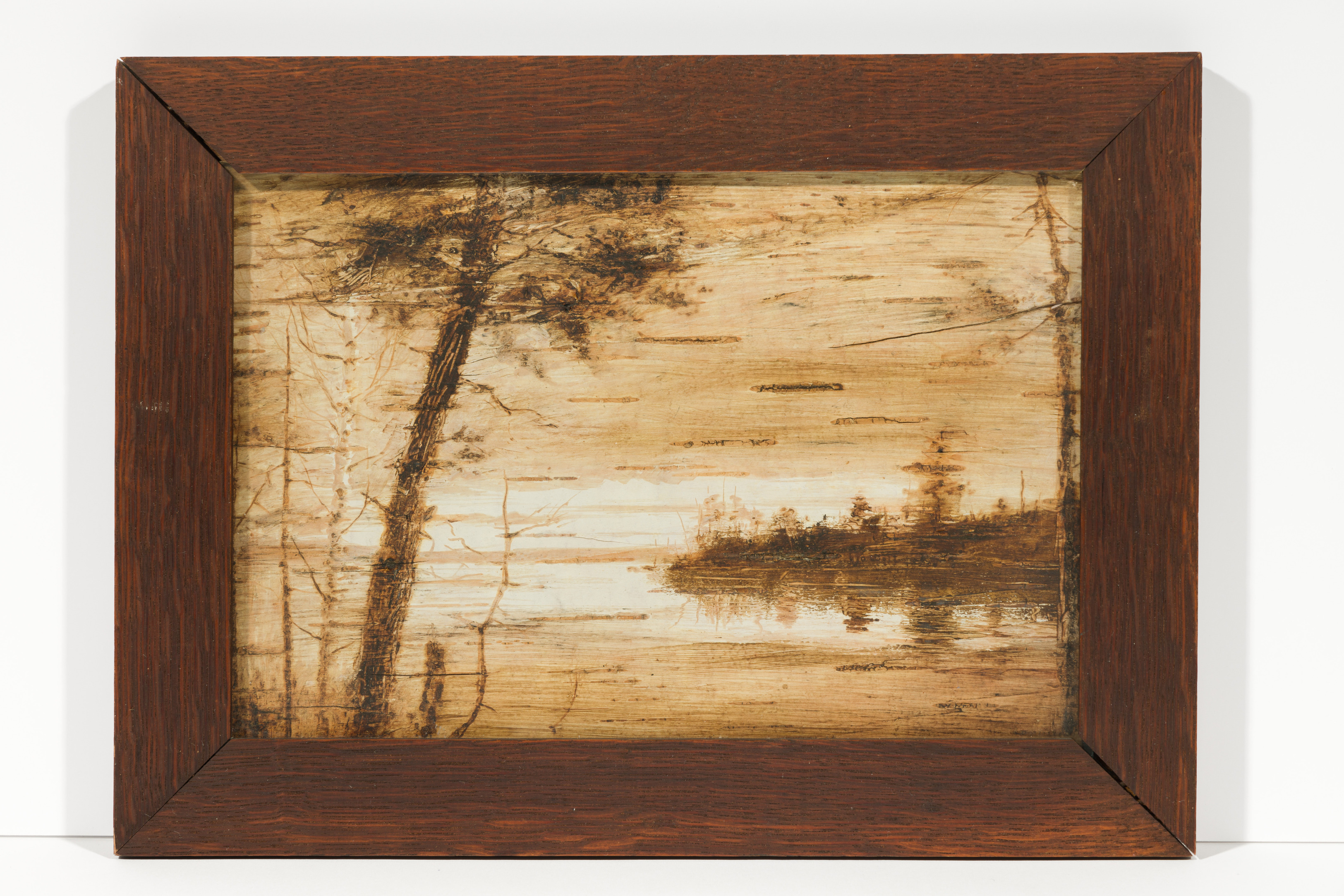 Birch-bark painting showing a tree next to a body of water with a shore in the distance using shades of brown and white.