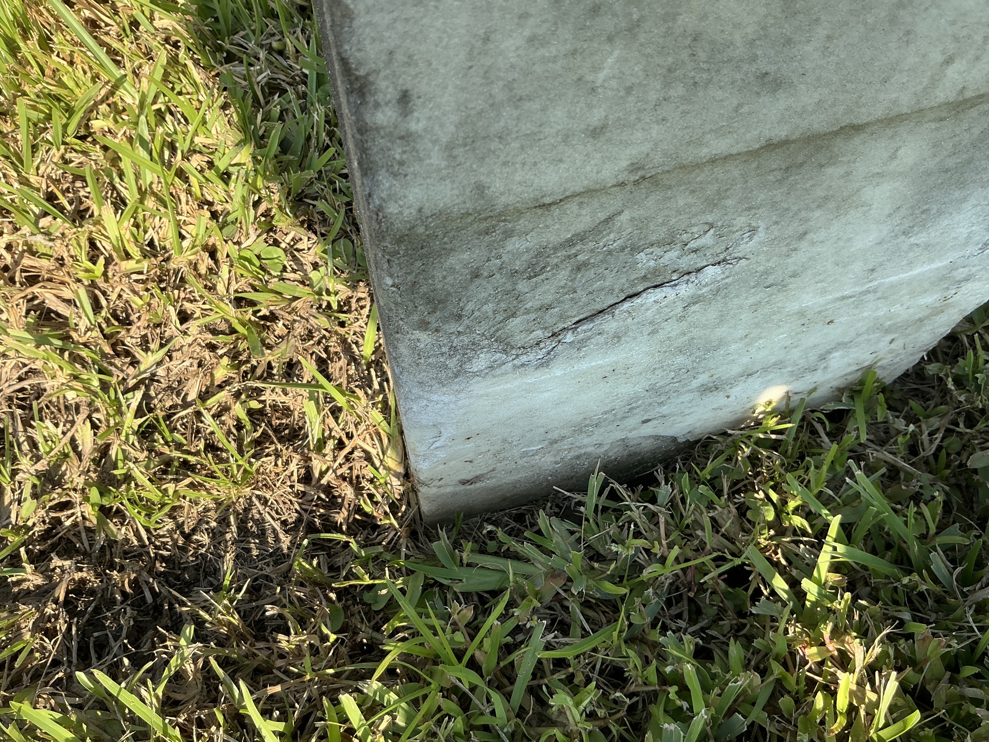 Extra image of historic upright marble headstone with recessed shield face.