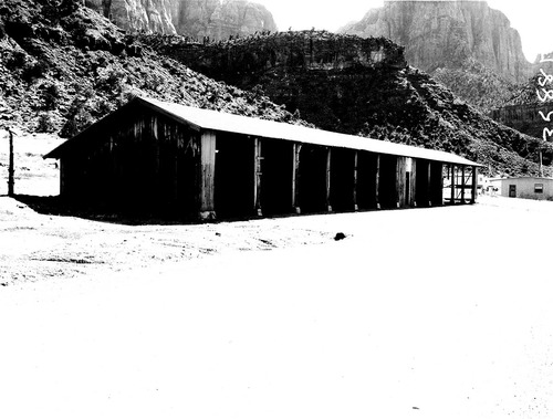 Old Civilian Conservation Corps (CCC) building used for storage and ready to be dismantled.