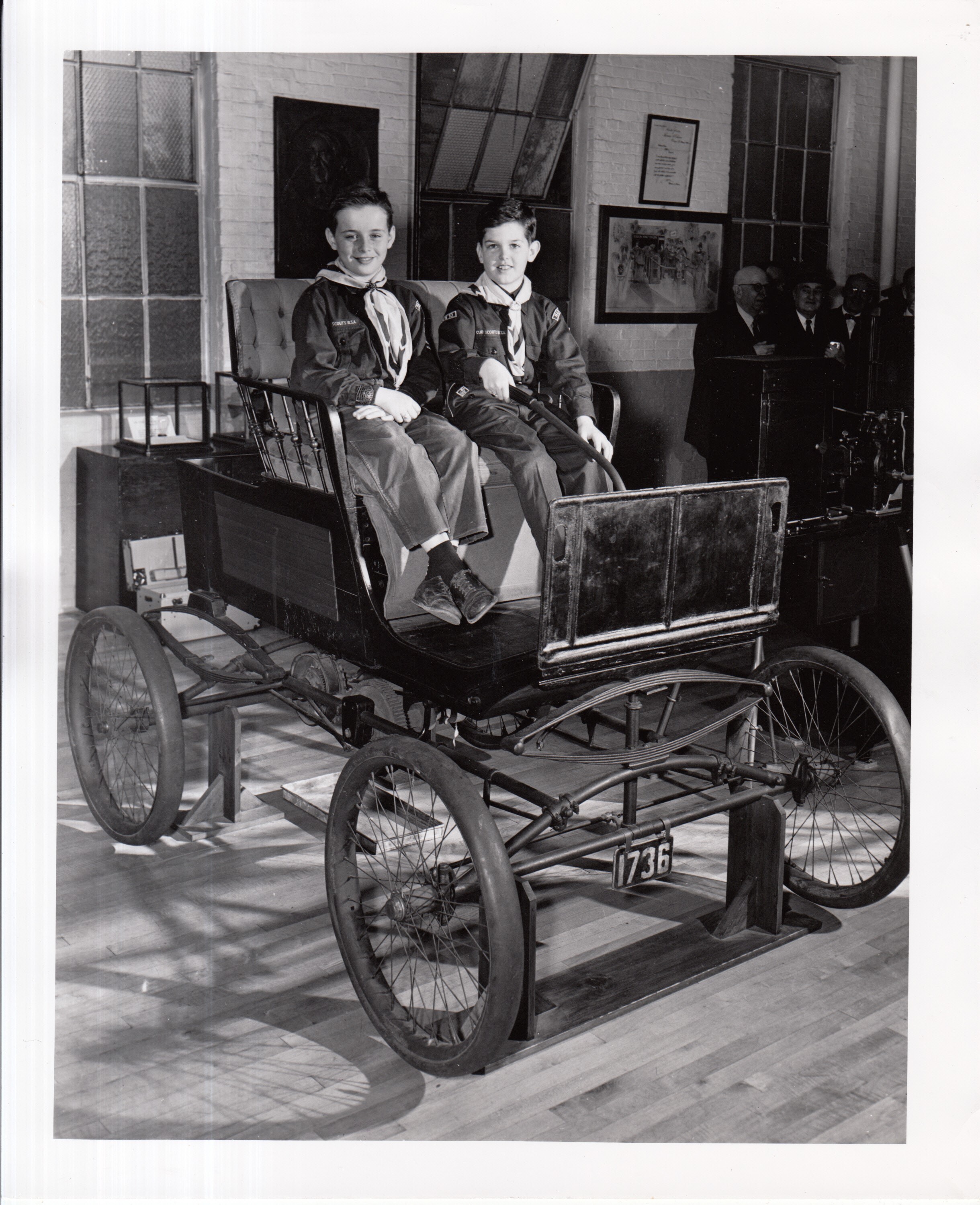 Two cub scouts seated in electric automobile (Locomobile) at Edison Museum.