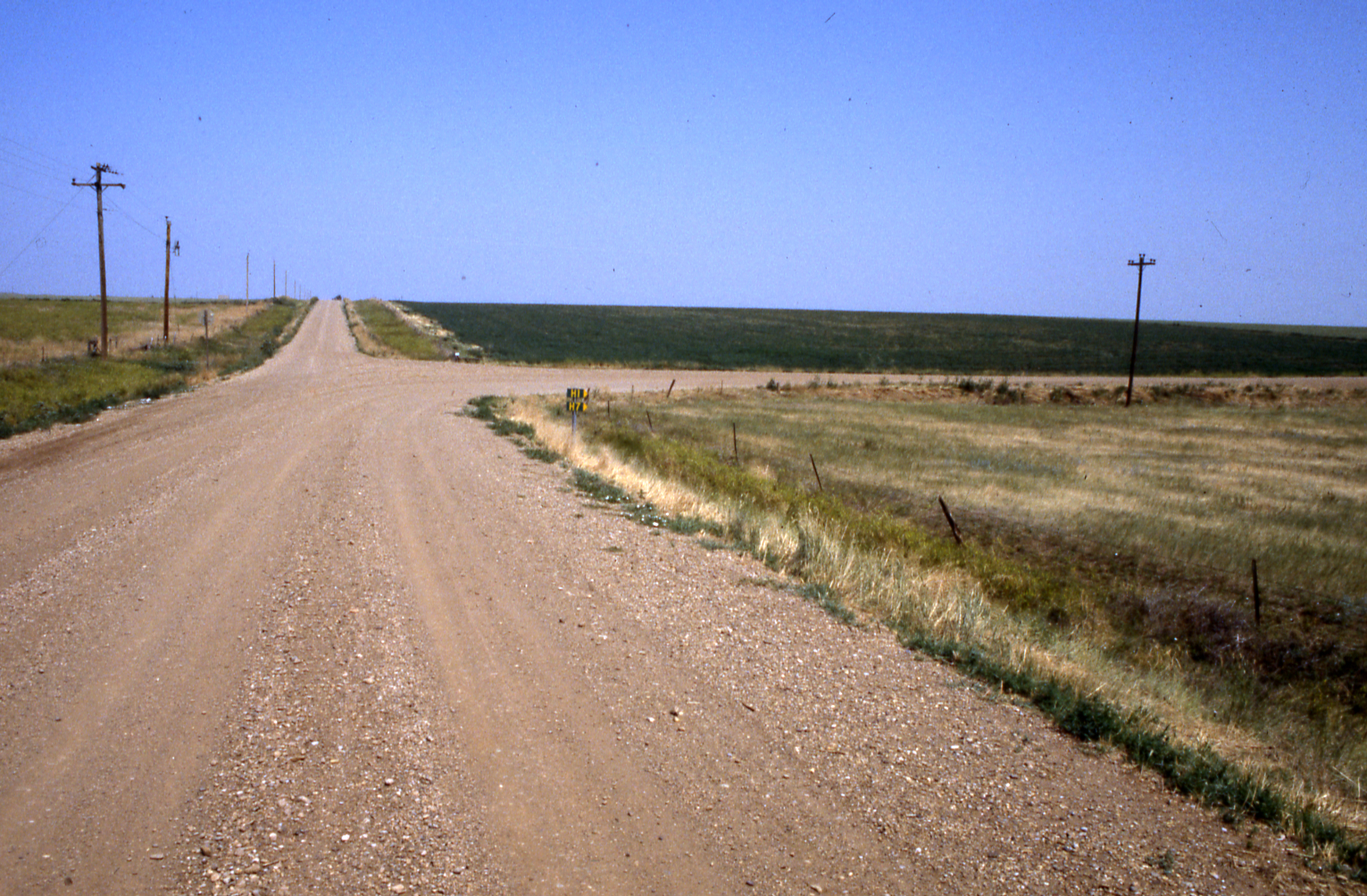 A gravel intersection in the prairie