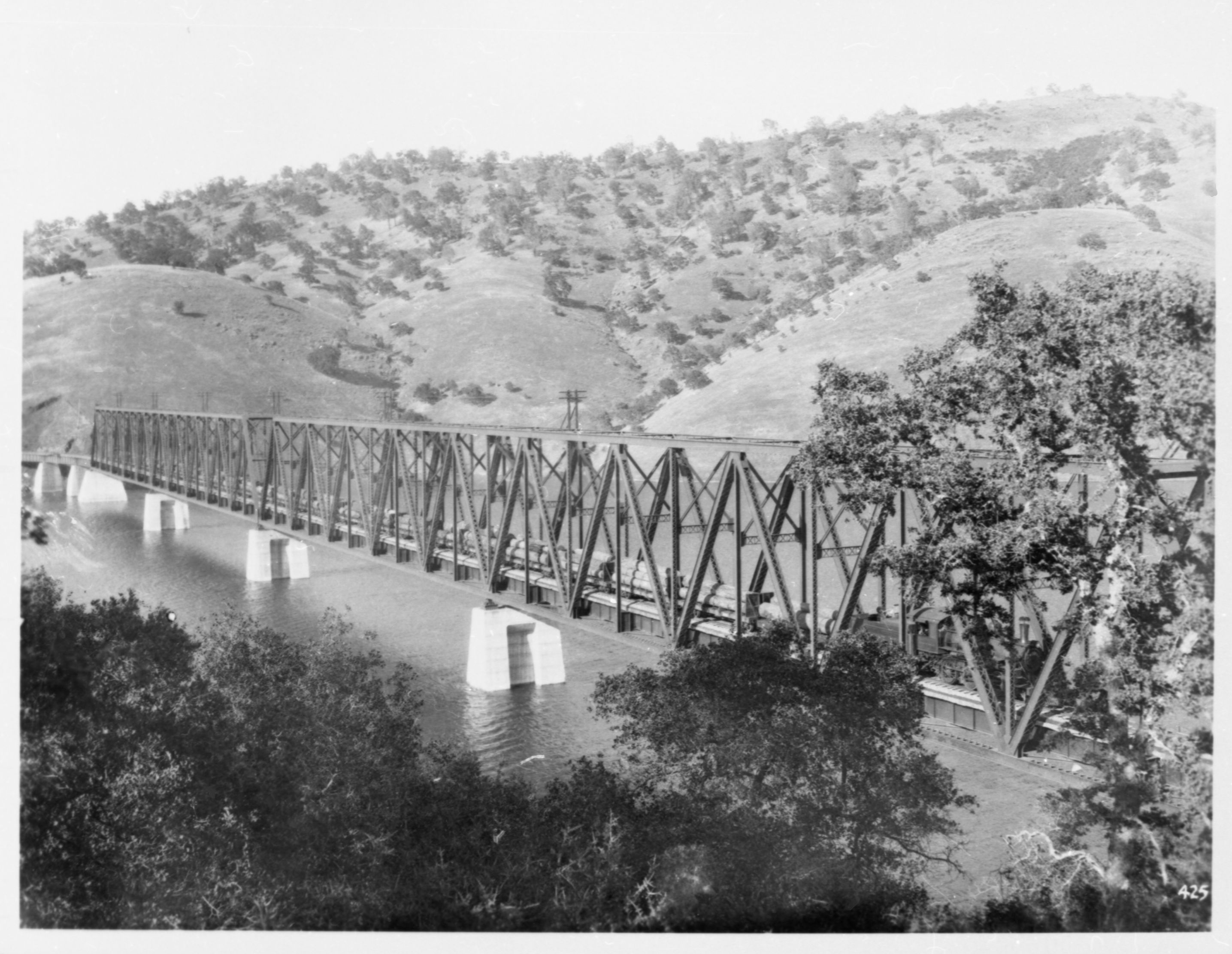 Copy Neg: J. Ernest, 1983. Barrett bridge over Exchequer Reservoir. From negative in file of Al Rose. Original print in over-sized photo drawl in RL.