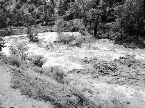 Virgin River in flood stage at the area of the 'Great Slide' below the Court of the Patriarchs.