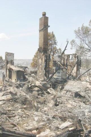 Burned houses following the Long Mesa fire, Mesa Verde National Park, August 2002