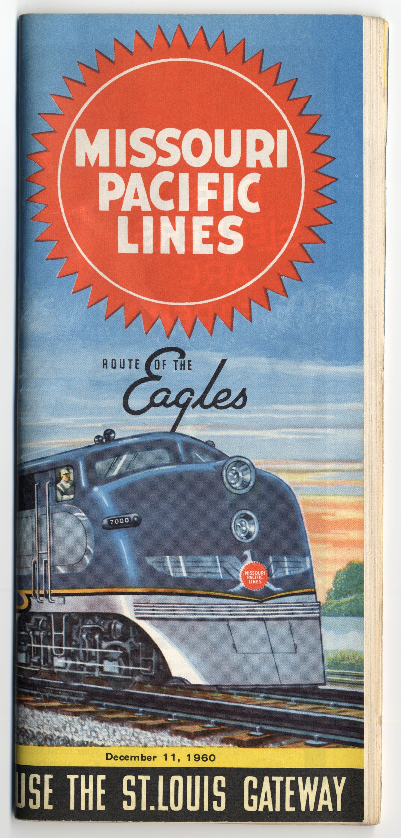 A timetable booklet with an illustration of a train on the front. The booklet has 34 pages.