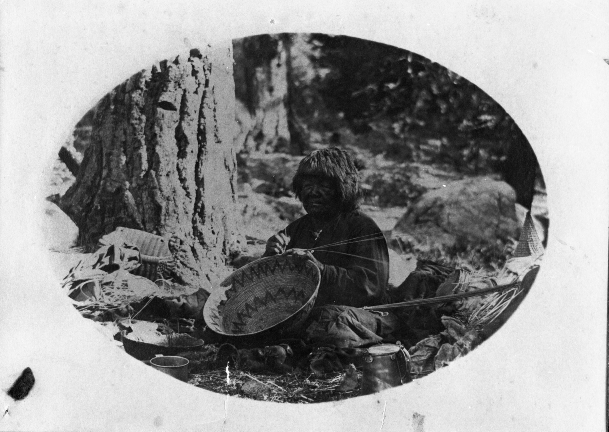 Kalapine, a Miwok woman weaving basket. Copied by Michael Dixon, Oct. 1980.