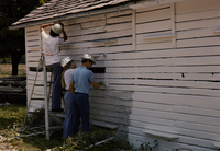 HFCA 1607_Special Events And VIPS Volume 1_052.jpg. People apart of the Youth Conservation Corps painting the side of a house in Gettysburg National Military Park.