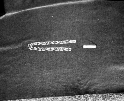 Marie Rozier Collection, Catalog No. 47. Object: Miwok beaded headband. Dimensions: 24 x 7/8". Materials: Orange, red, black glass beads; black cotton thread. Technology: Loomless double weft. Collection History: Made by Louise Fuentes in 1950s. Photographed by Michael Dixon in December 1982. Catalogued by Craig Bates and Barbara Beroza. Yosemite Collections, National Park Service.