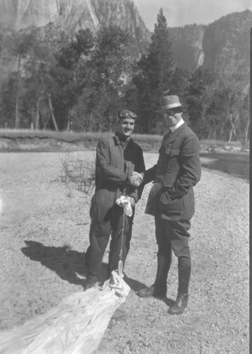 Sargeant Atherton, USMC, completes first parachute jump into Yosemite and is welcomed by acting Supt. Leavitt.