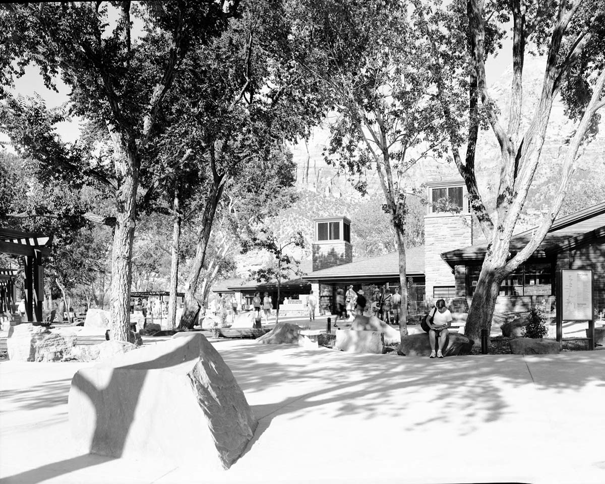 The 2000 visitor center after completion, part of the transportation project which included the shuttle buses, bus maintenance area, the new visitor center (Watchman campground, old a-loop), and new human history museum.