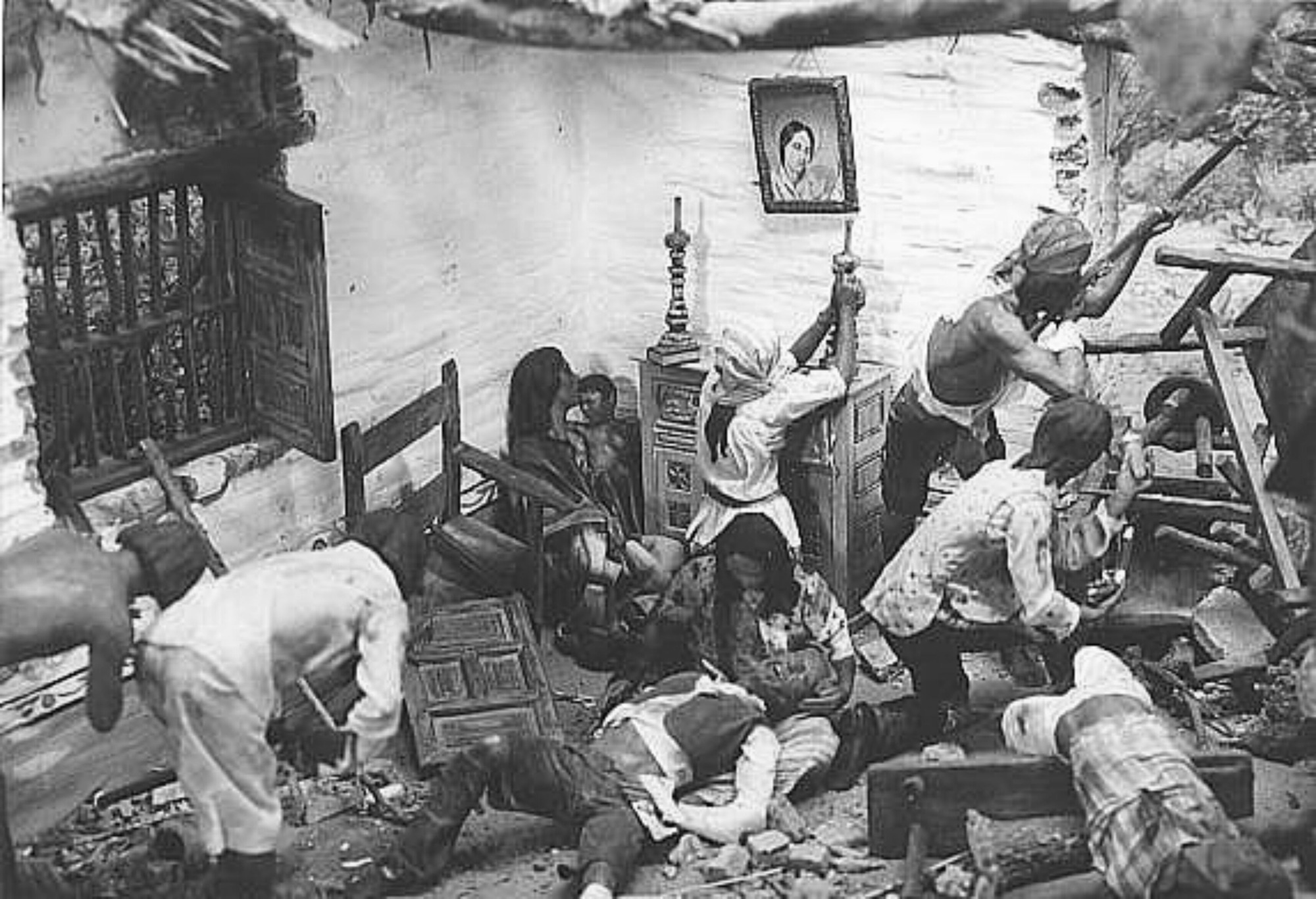 Closeup of Rebellion diorama with gunmen, injured people, and women praying