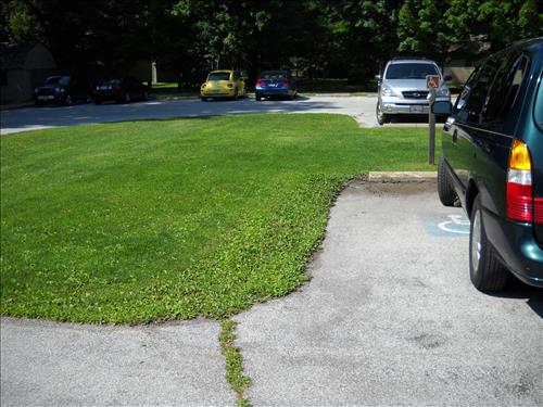 Pooling water in Handicap Access space at James A. Garfield NHS