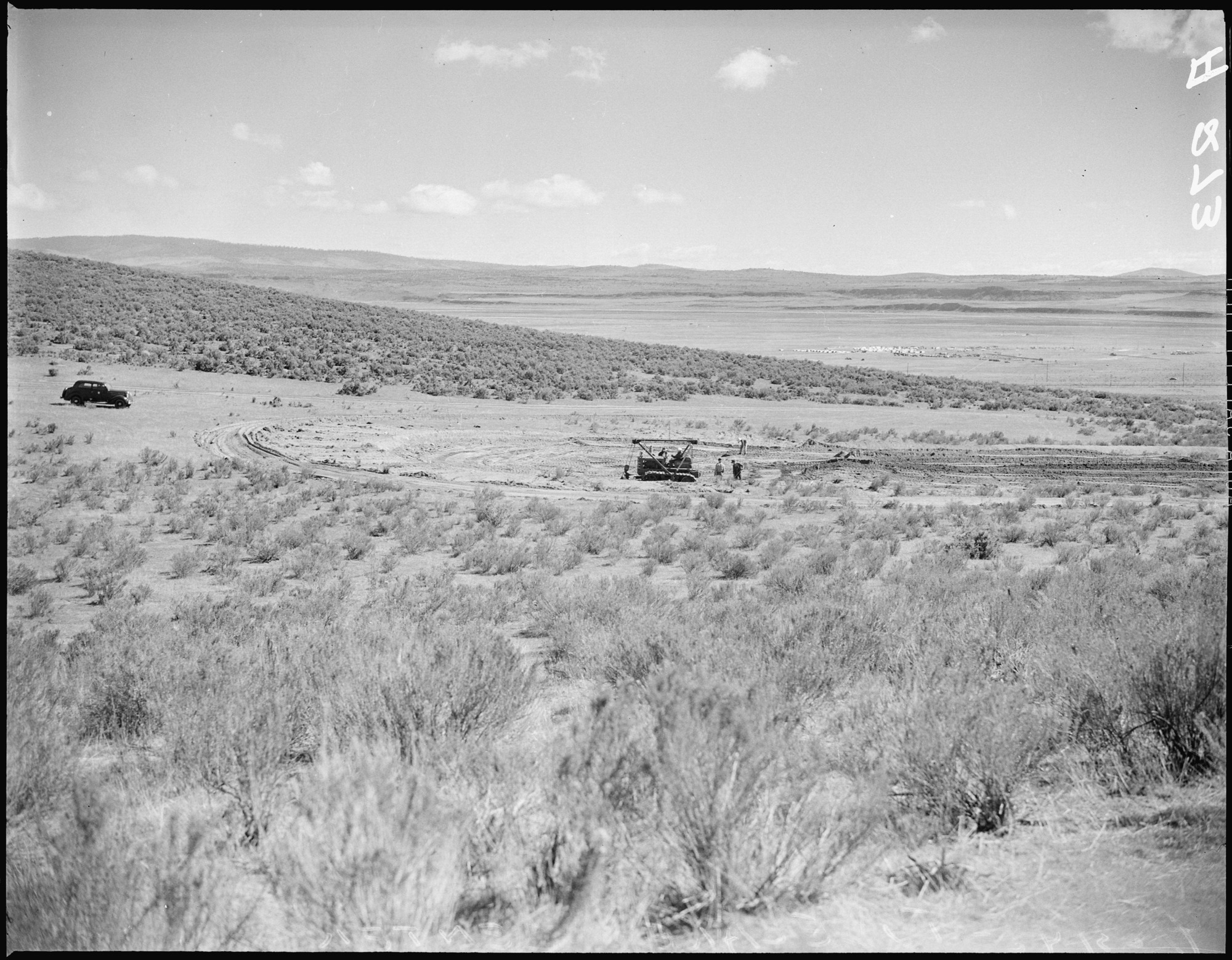 Land is being cleared for the construction of barrack homes at this War Relocation Authority center for evacuees of Japanese ancestry