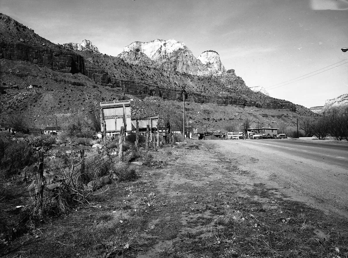 Roadside signs in Springdale. Reverse side of signs seen by visitors on approach to Zion signs.