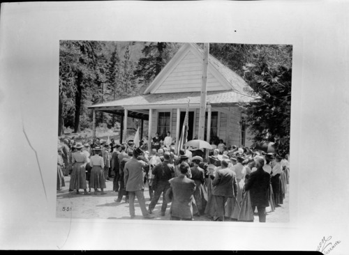 Crowd at old schoolhouse for graduation. From John Dexter collection.