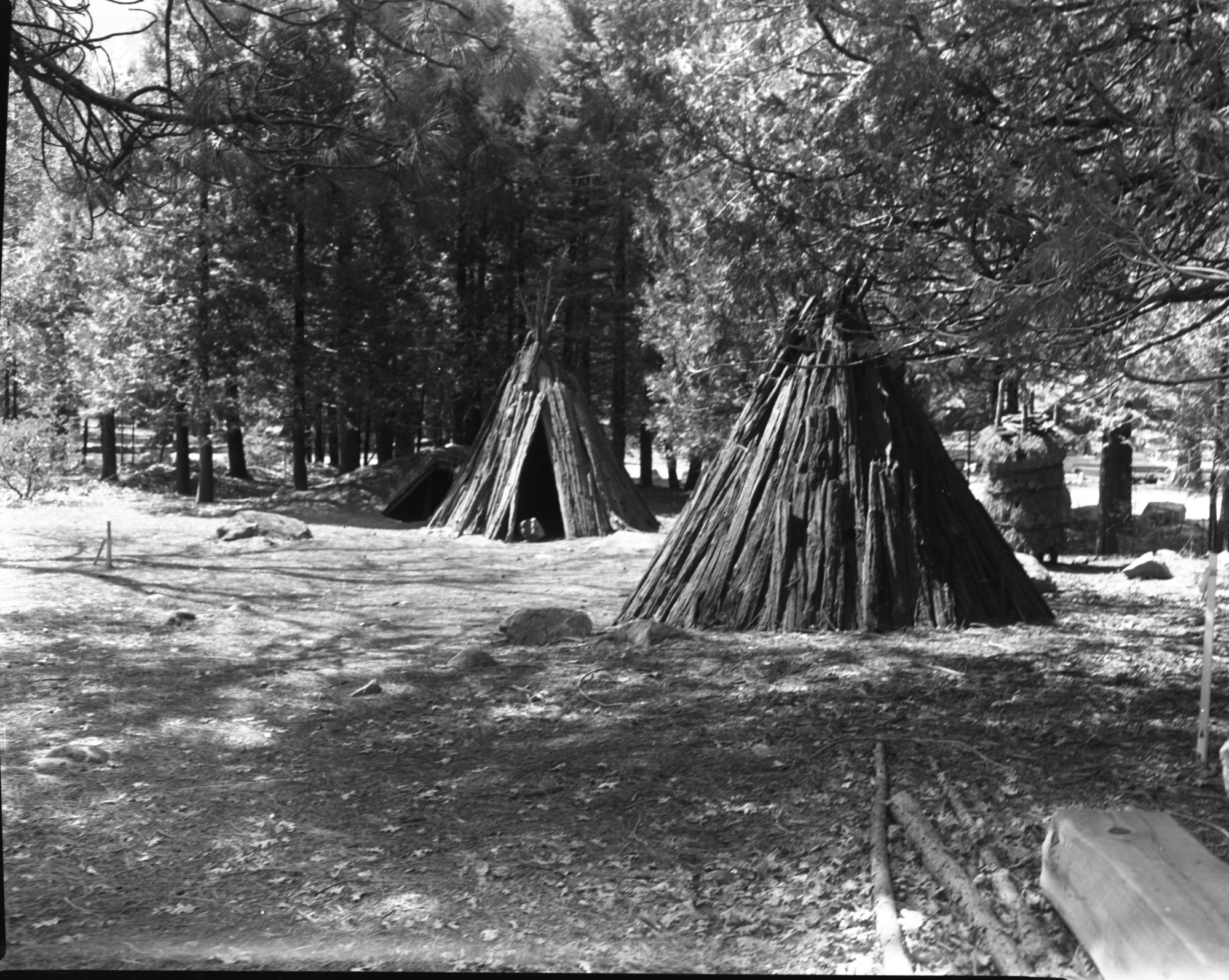 Native American structures in the Wildflower Garden. Yosemite Valley, Yosemite Village. Considered for Exhibit Item 2-51.
