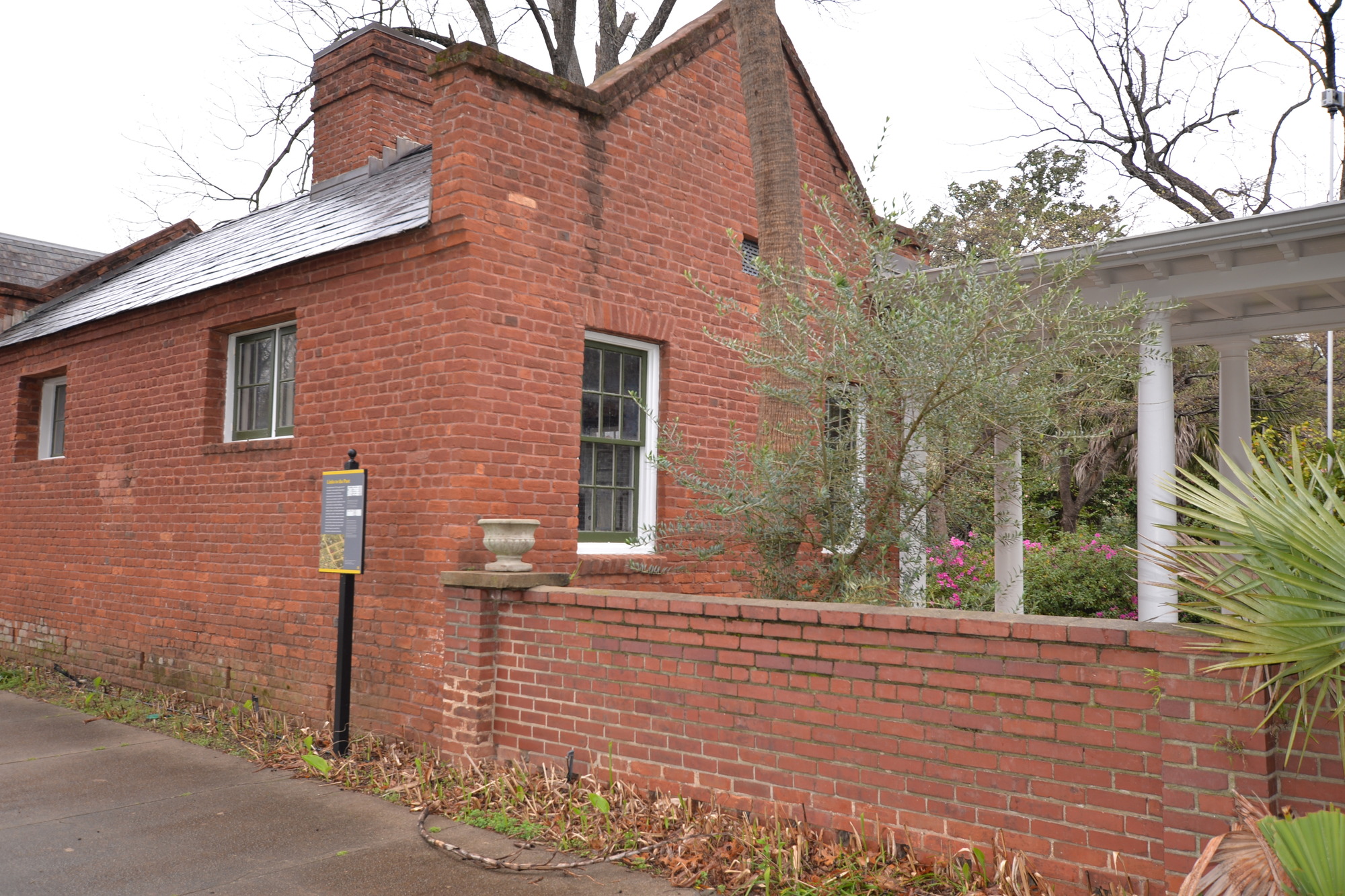 Brick structure with centralized chimney.